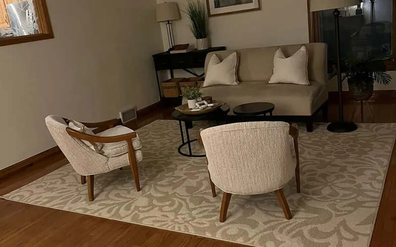Freshly painted living room with clean walls and staged furniture in Fort Collins