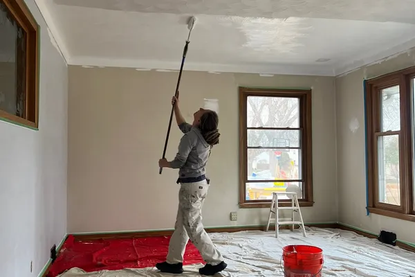 Professionally painted kitchen cabinets and walls with clean, precise lines