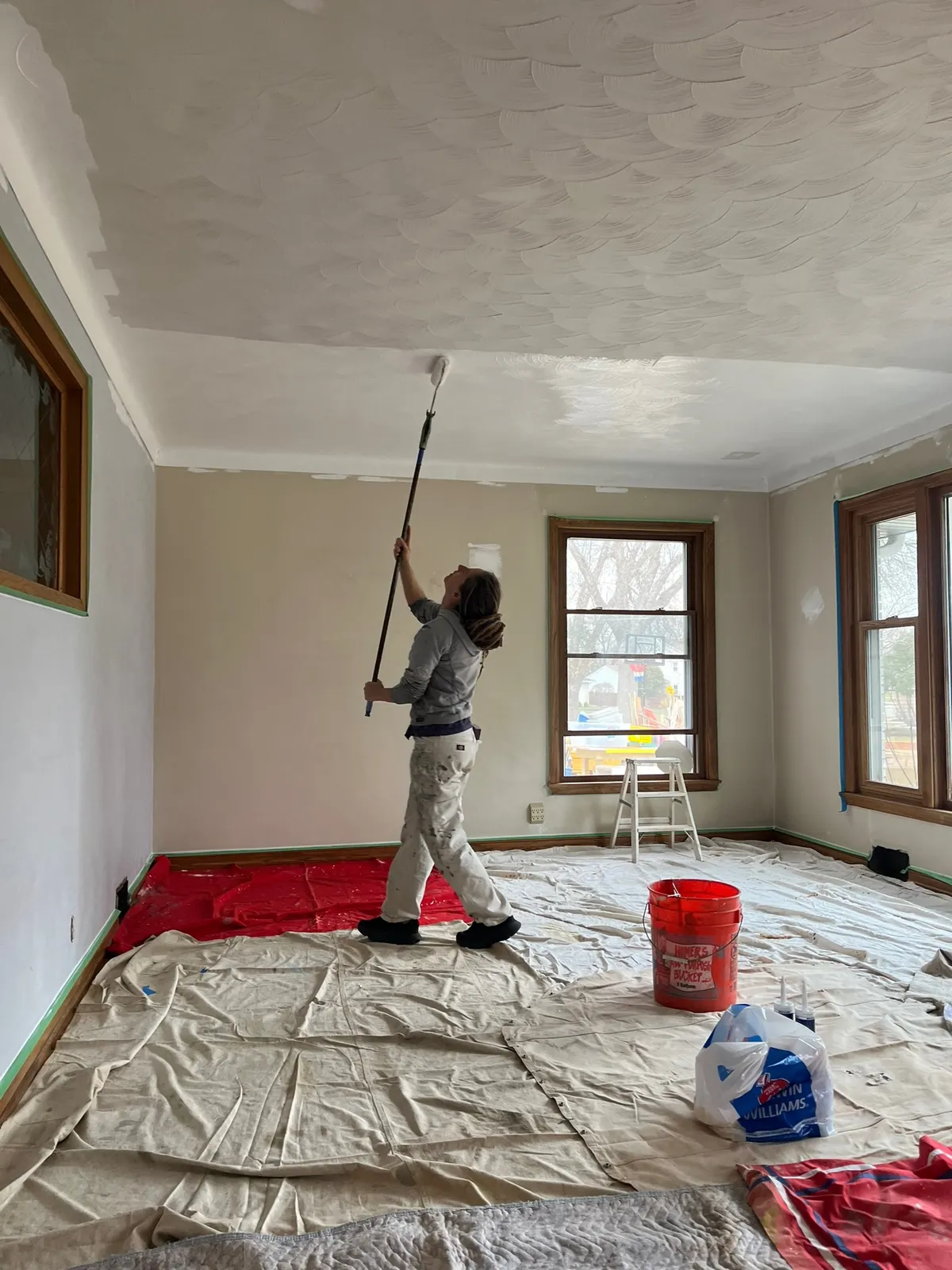 Professionally painted kitchen cabinets and walls with clean, precise lines