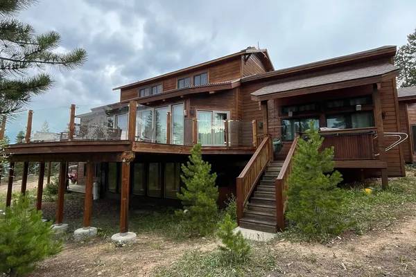 Professional exterior painting on a sunny Colorado day